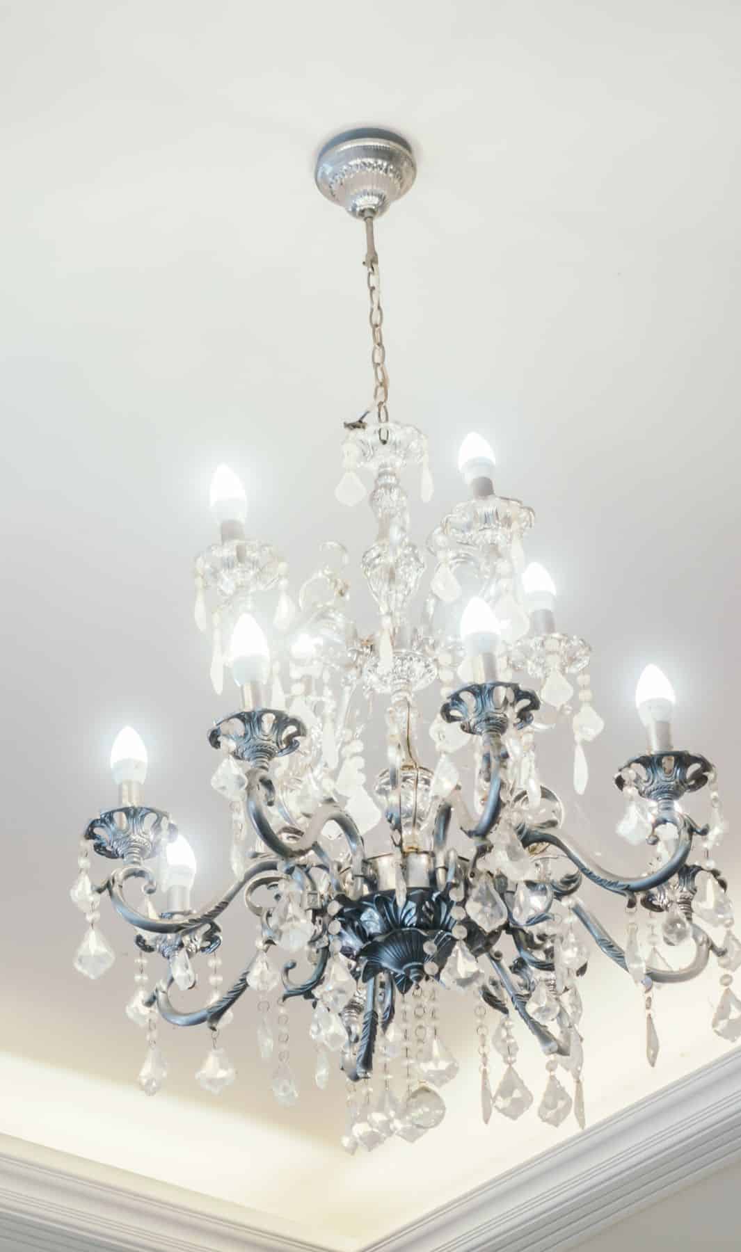 A crystal chandelier restored to full sparkle after an on-site hand cleaning