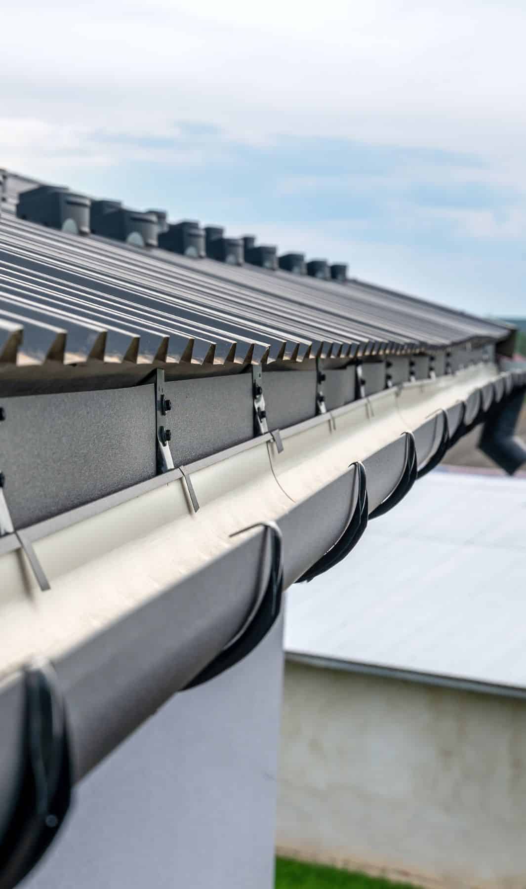 Clean commercial gutters after service
