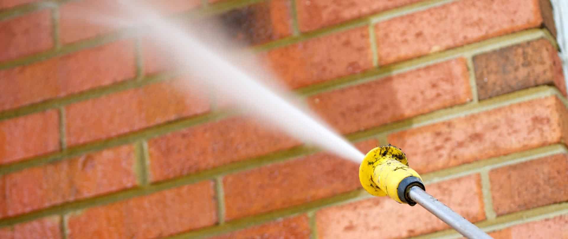 Commercial pressure washing cleaning a Sacramento business exterior