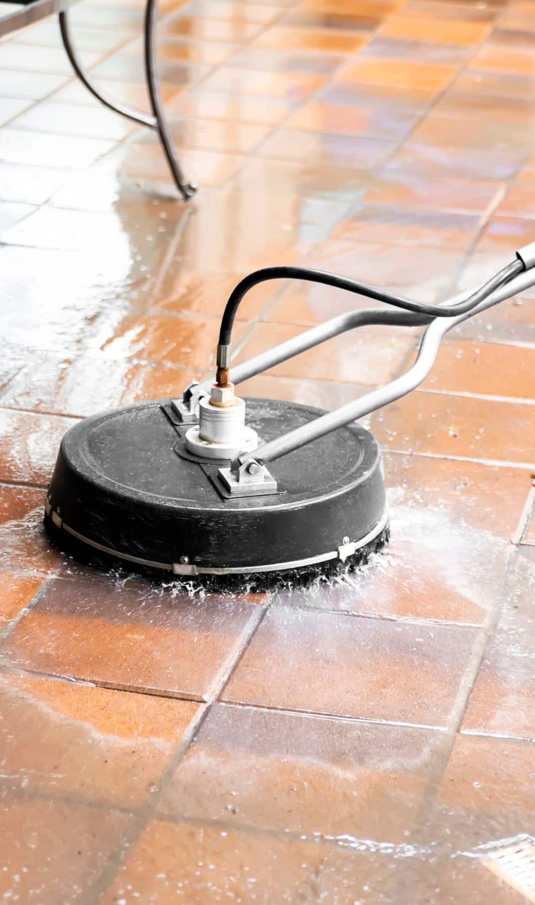 Tile floor deep cleaning in progress